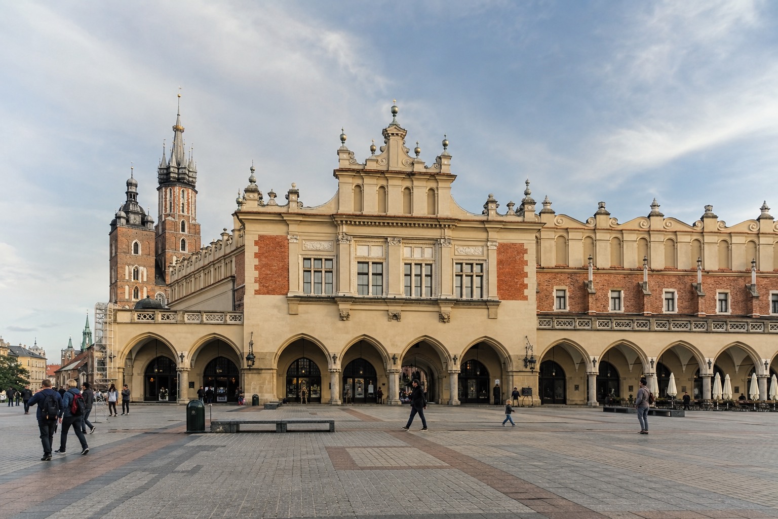 The Cloth Hall (Sukiennice) on the Main Market Square in Kraków, with the towers of St. Mary's Basilica in the background